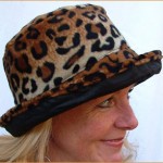 Black Wax Leopard Faux Fur Reversible Hat